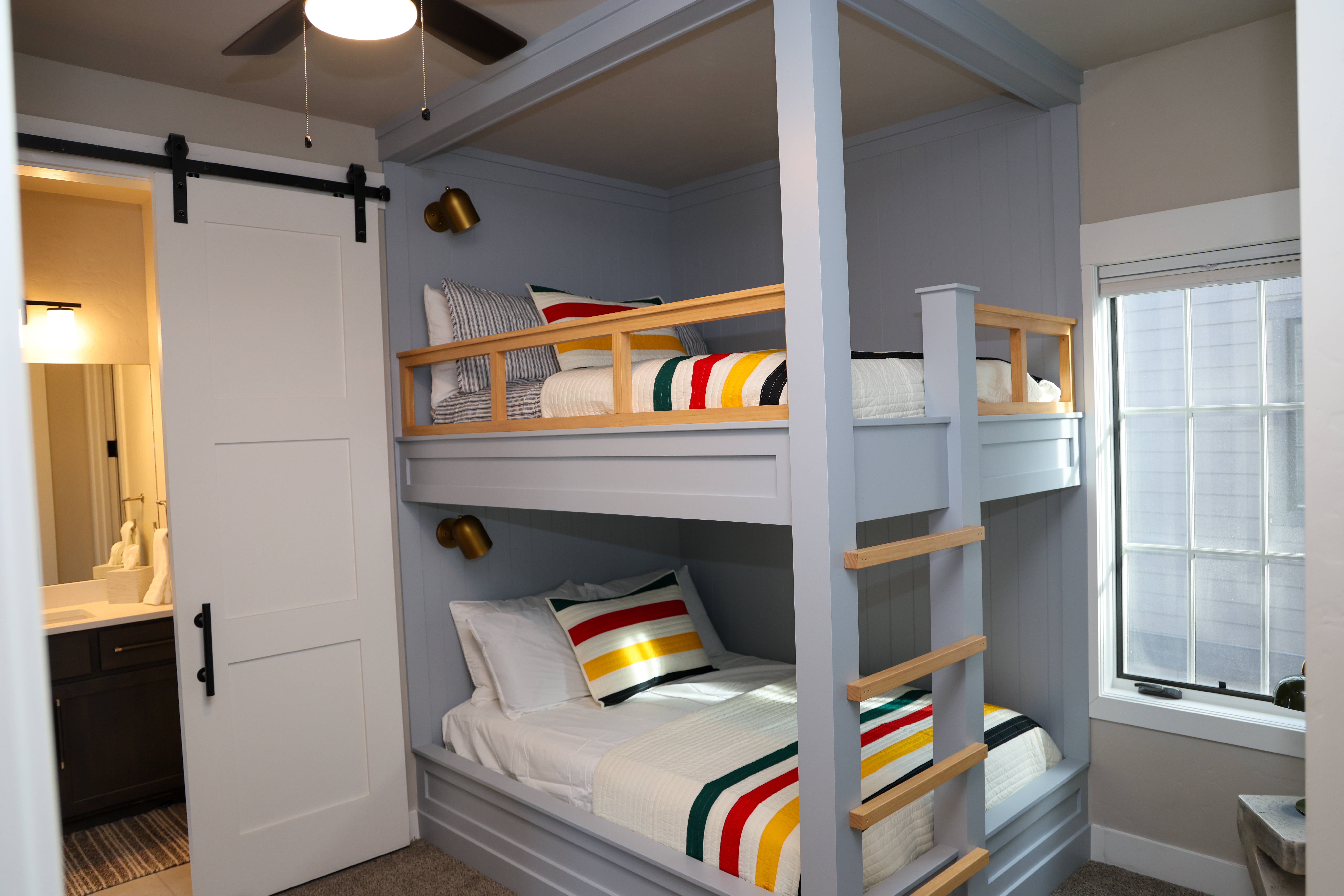 Bunk room with built-in beds